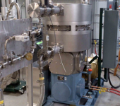 A tritium-compatible pump is part of a test stand used to assess pumping speed and pump reliability.